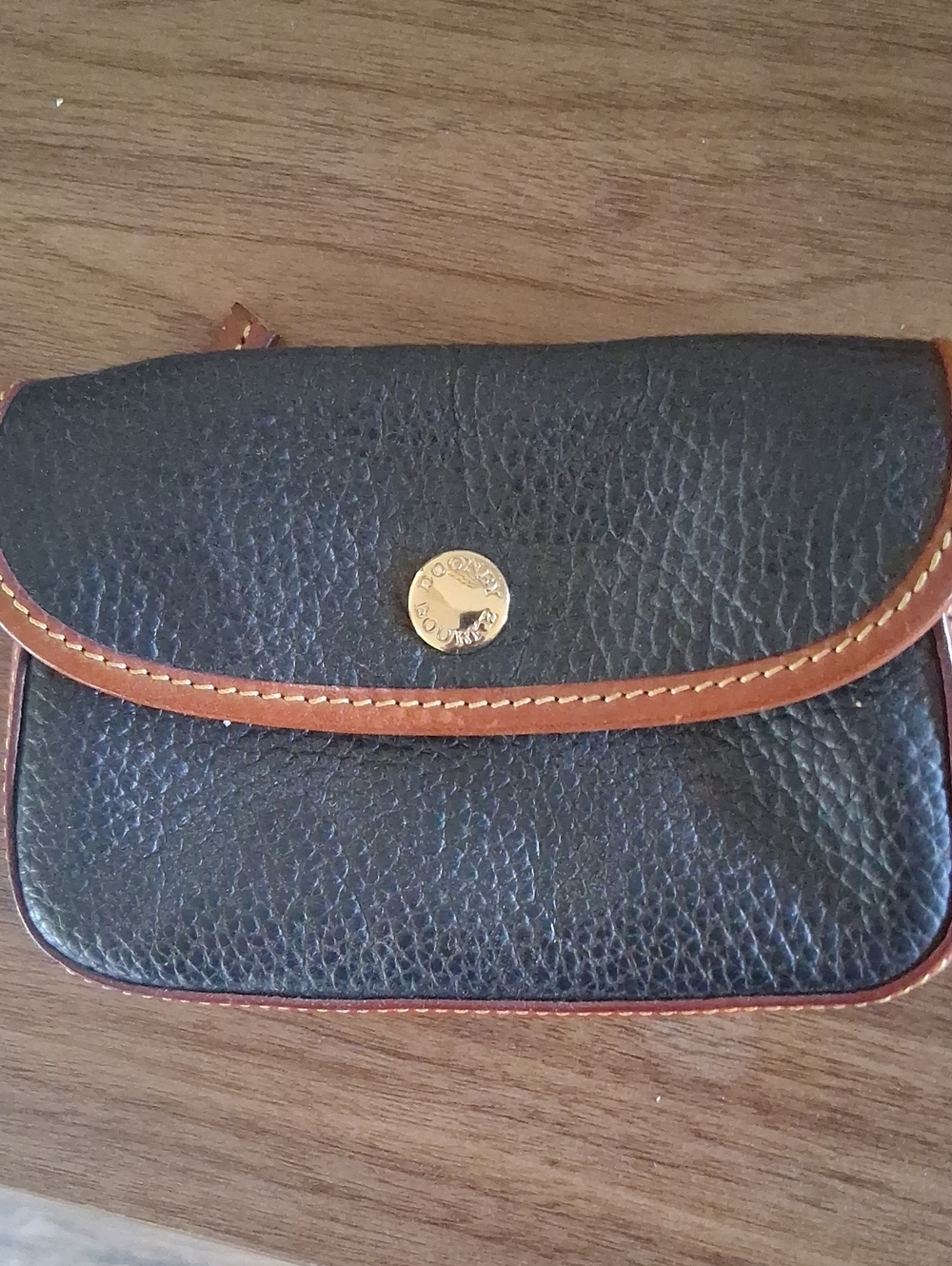 GUC Dooney & Bourke Black Pebble Leather Pouch with Brown Trim